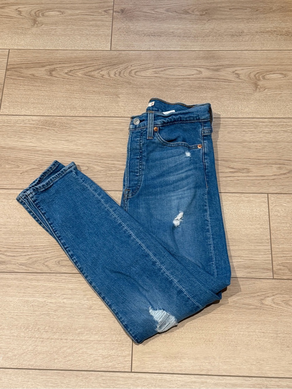 Levi's Women's Wedgie Skinny Jeans in Medium Blue with Distressing 27” Inseam